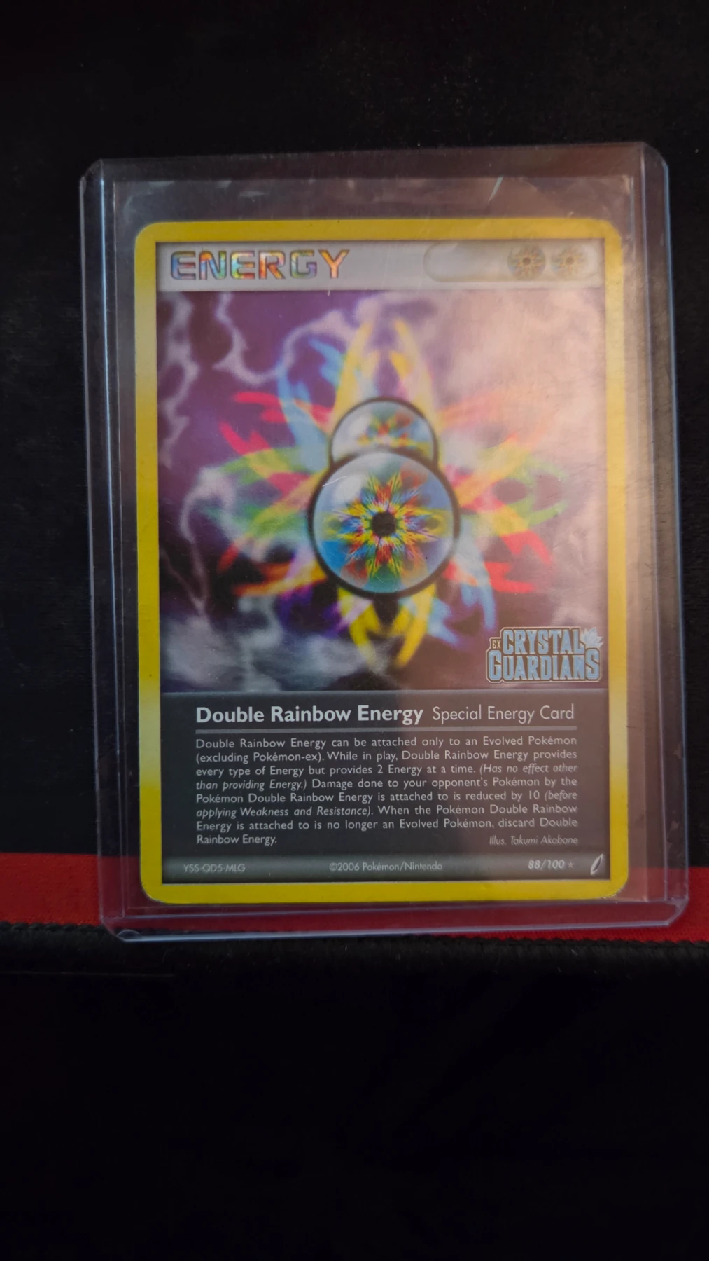 Double Rainbow Energy 088/100 Crystal Guardians front card photo in PokeToGrade pregrading report