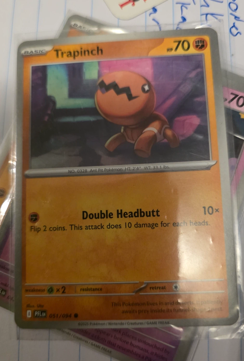 Trapinch 051/94 Phantasmal Flames front card photo in PokeToGrade pregrading report
