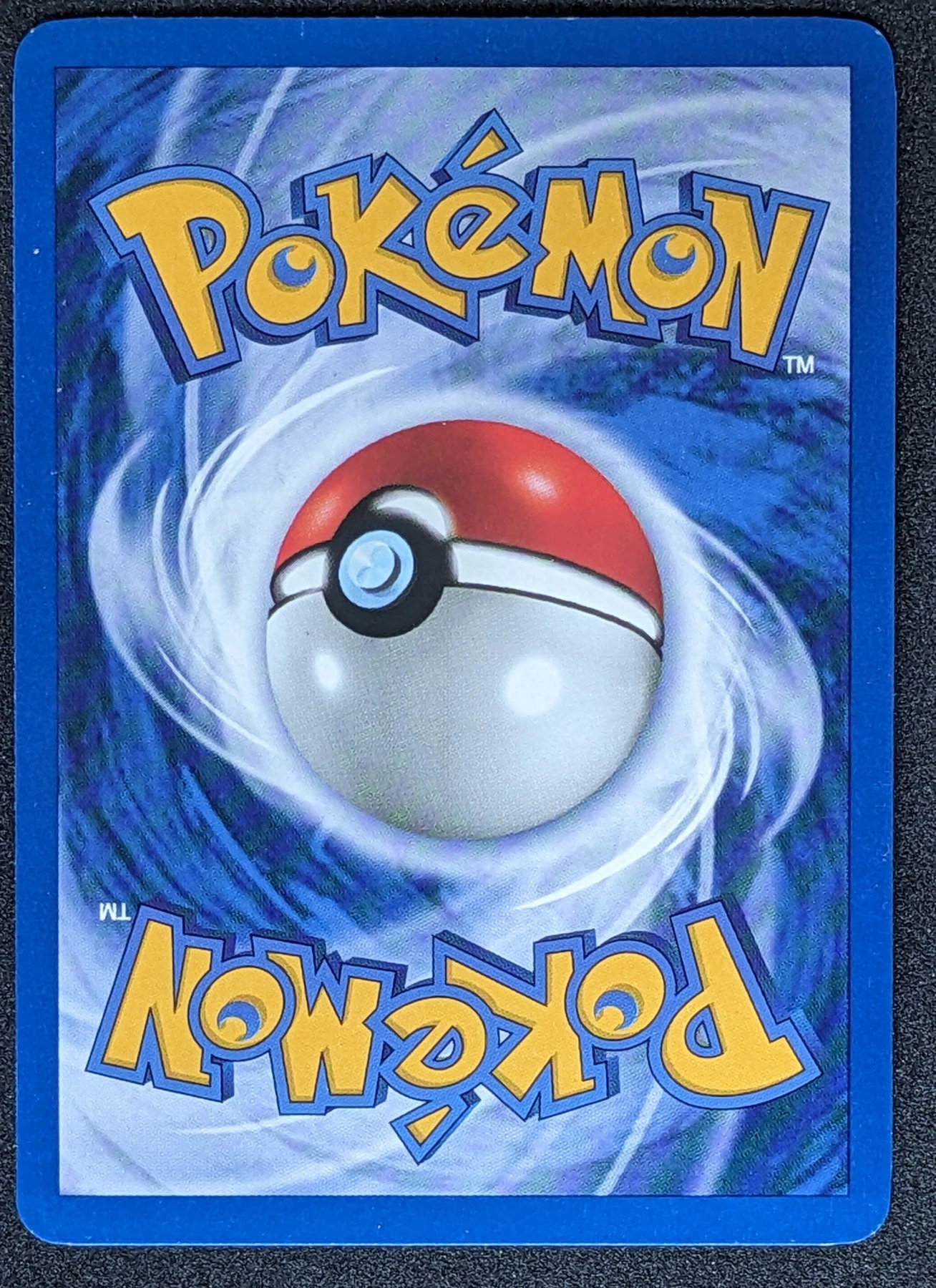 Dark Raichu 083/82 · First Edition Stamp Team Rocket back card photo in PokeToGrade pregrading report