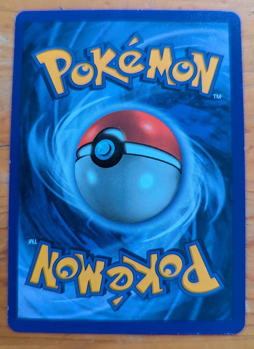 Charizard 004/102 Base Set back card photo in PokeToGrade pregrading report