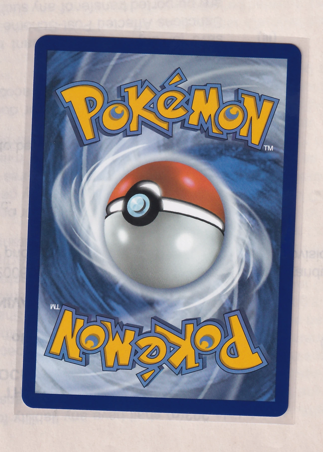 Maushold 146/128 30th Celebration back card photo in PokeToGrade pregrading report