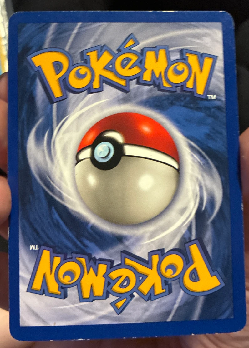 Charizard 004/130 Base Set 2 back card photo in PokeToGrade pregrading report
