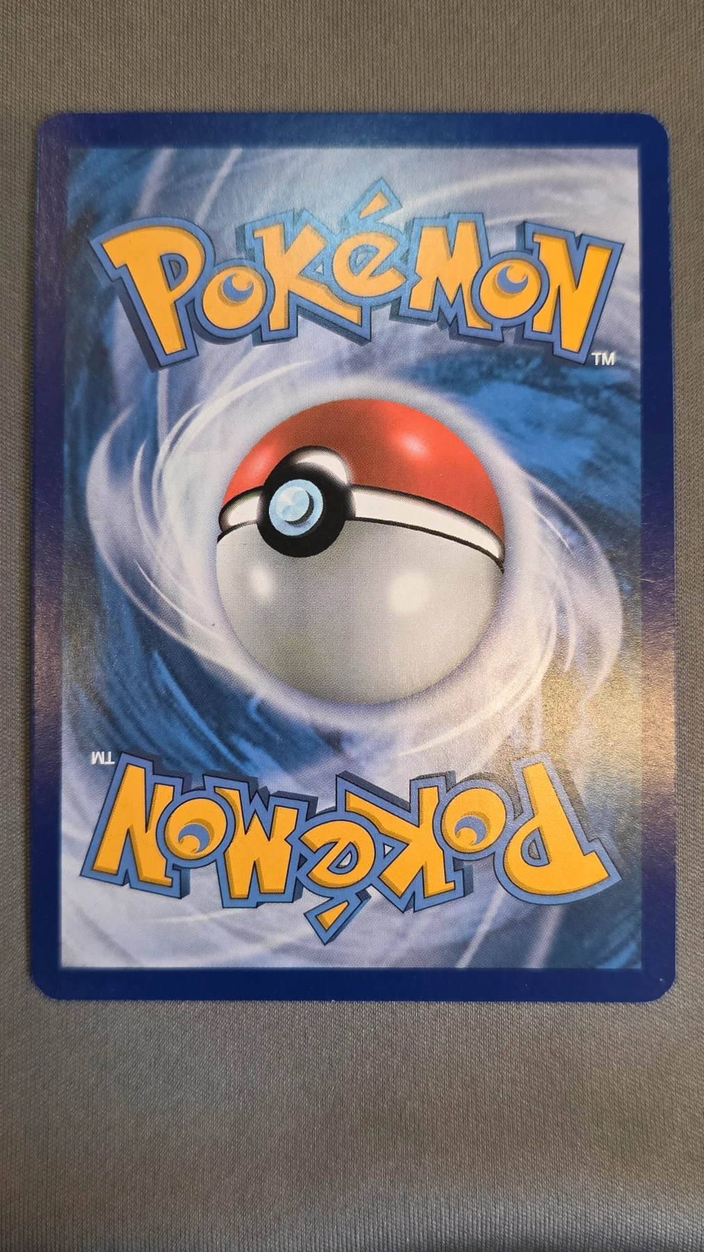 Charizard GX 150/147 Burning Shadows back card photo in PokeToGrade pregrading report