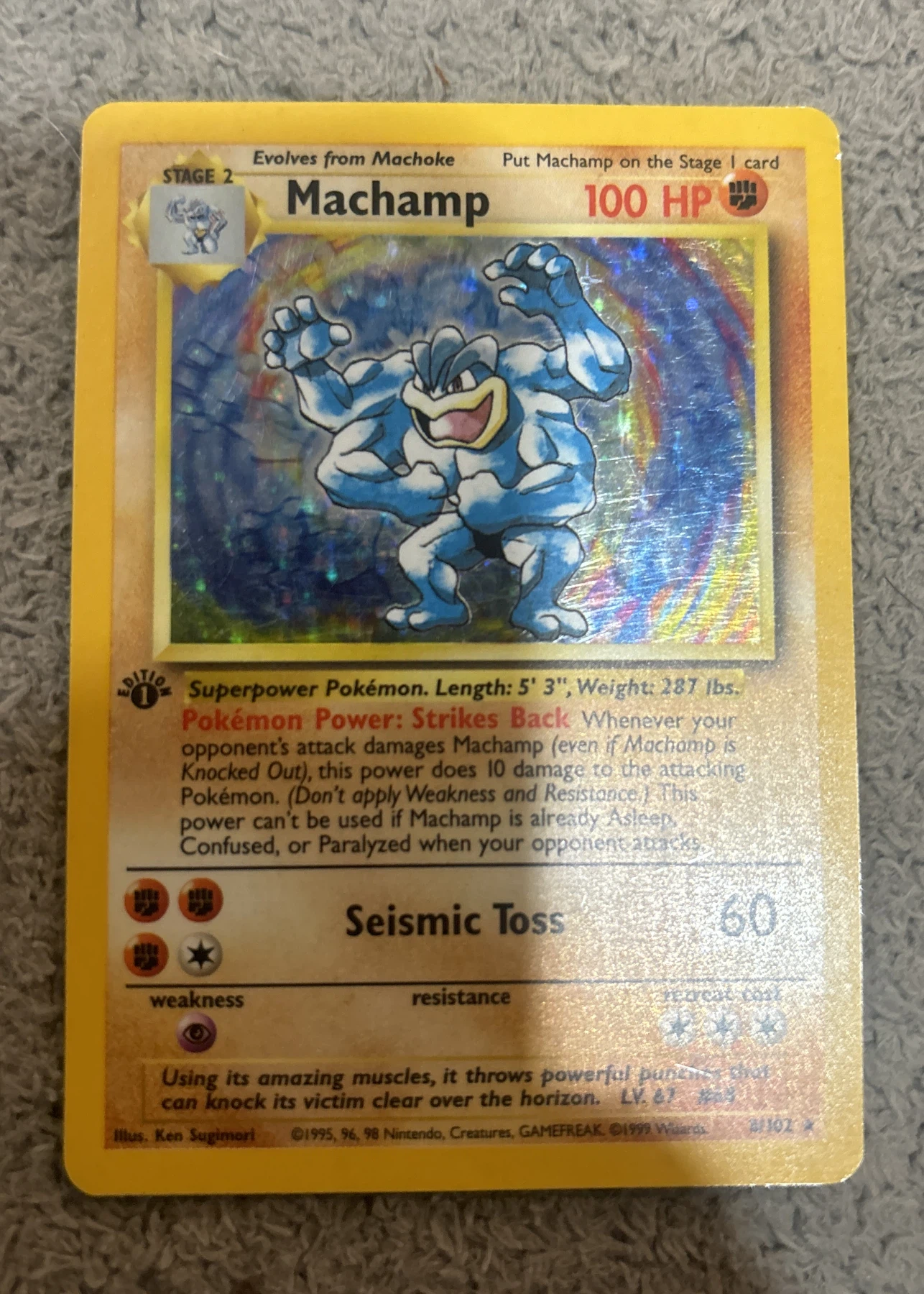 Machamp 008/102 (First Edition Stamp) Base Set front card photo in PokeToGrade pregrading report