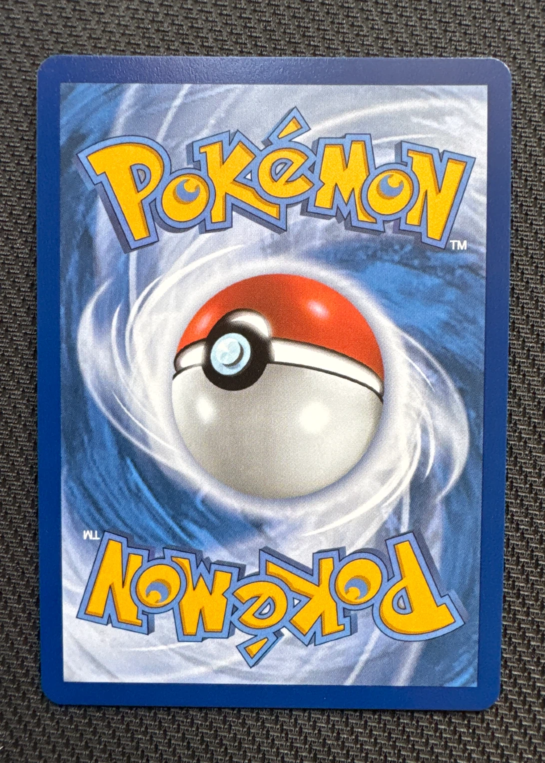 Hisuian Zorua 145/128 30th Celebration back card photo in PokeToGrade pregrading report
