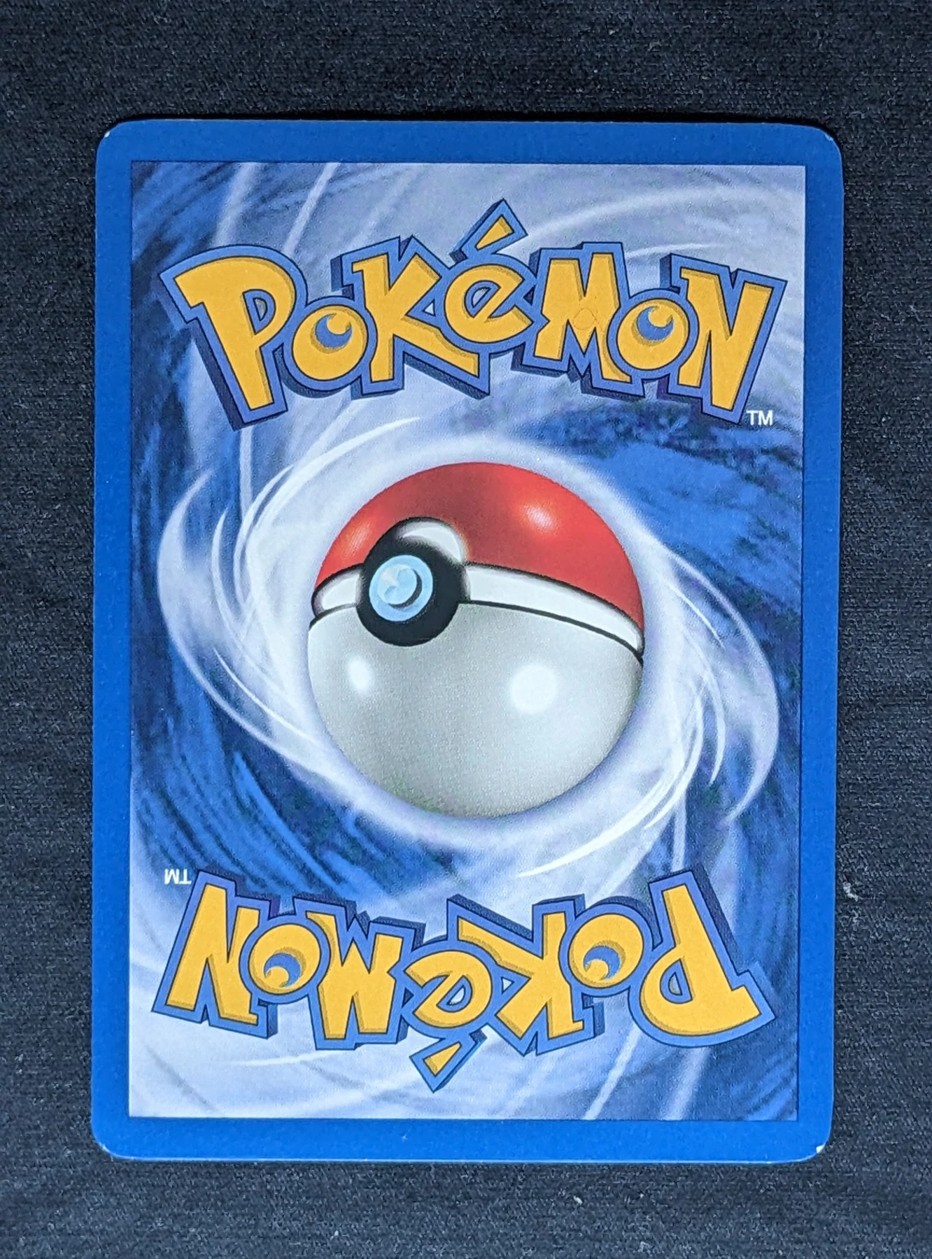 Dark Charizard 004/82 (First Edition Stamp) Team Rocket back card photo in PokeToGrade pregrading report