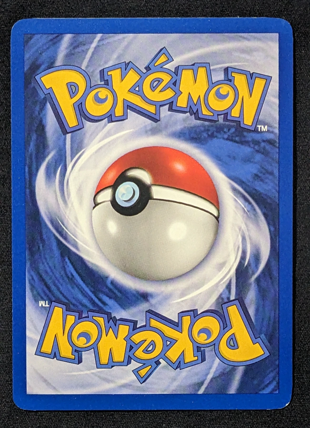 Dark Dragonite 005/82 (First Edition Stamp) Team Rocket back card photo in PokeToGrade pregrading report