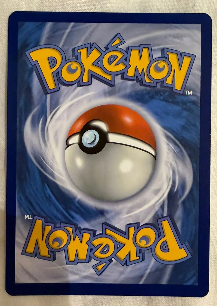 Morty's Conviction 211/162 Temporal Forces back card photo in PokeToGrade pregrading report