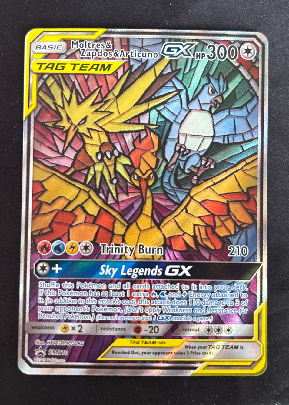 Moltres & Zapdos & Articuno GX SM210/248 SM Black Star Promos front card photo in PokeToGrade pregrading report