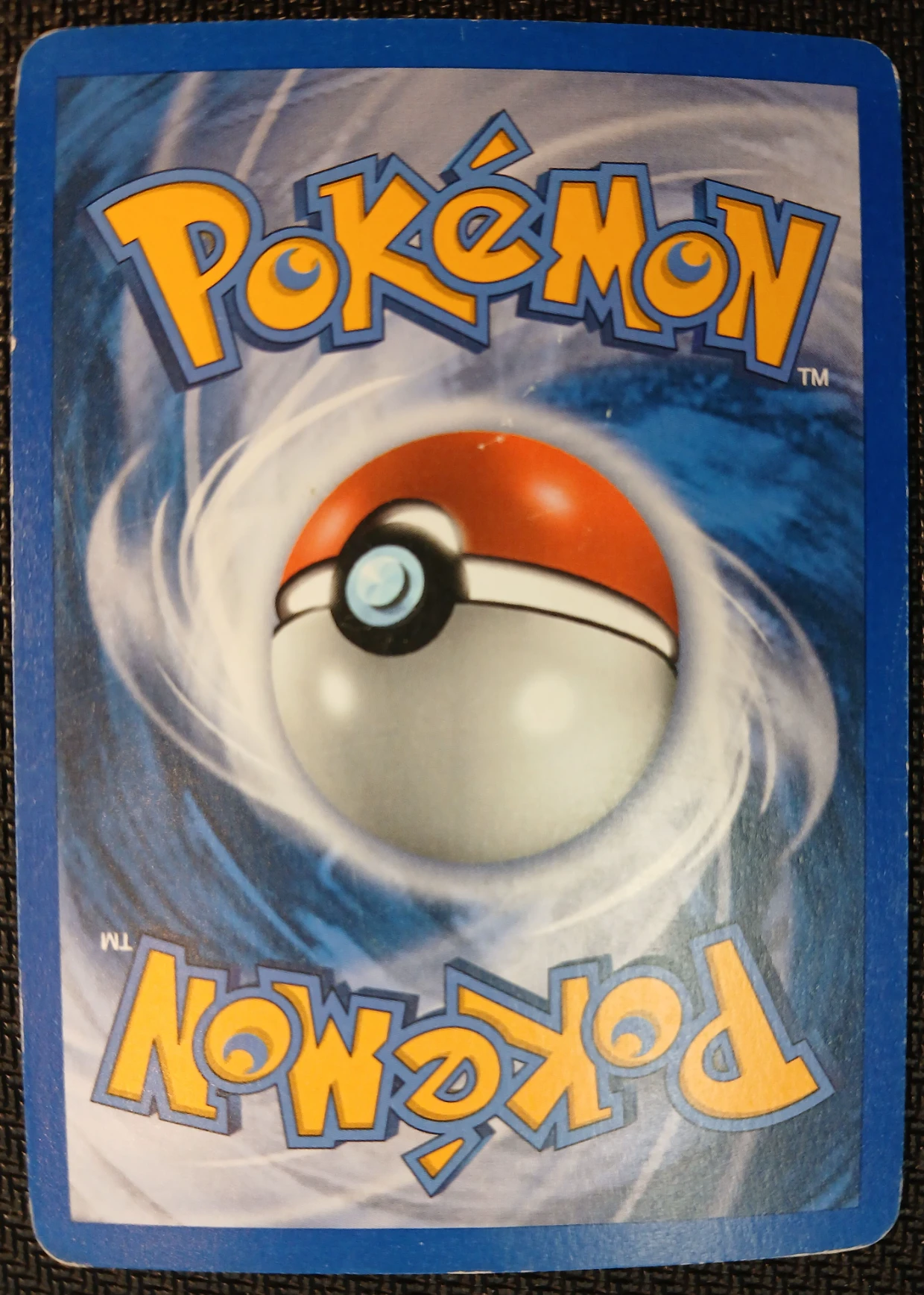 Umbreon ex 112/115 Unseen Forces back card photo in PokeToGrade pregrading report
