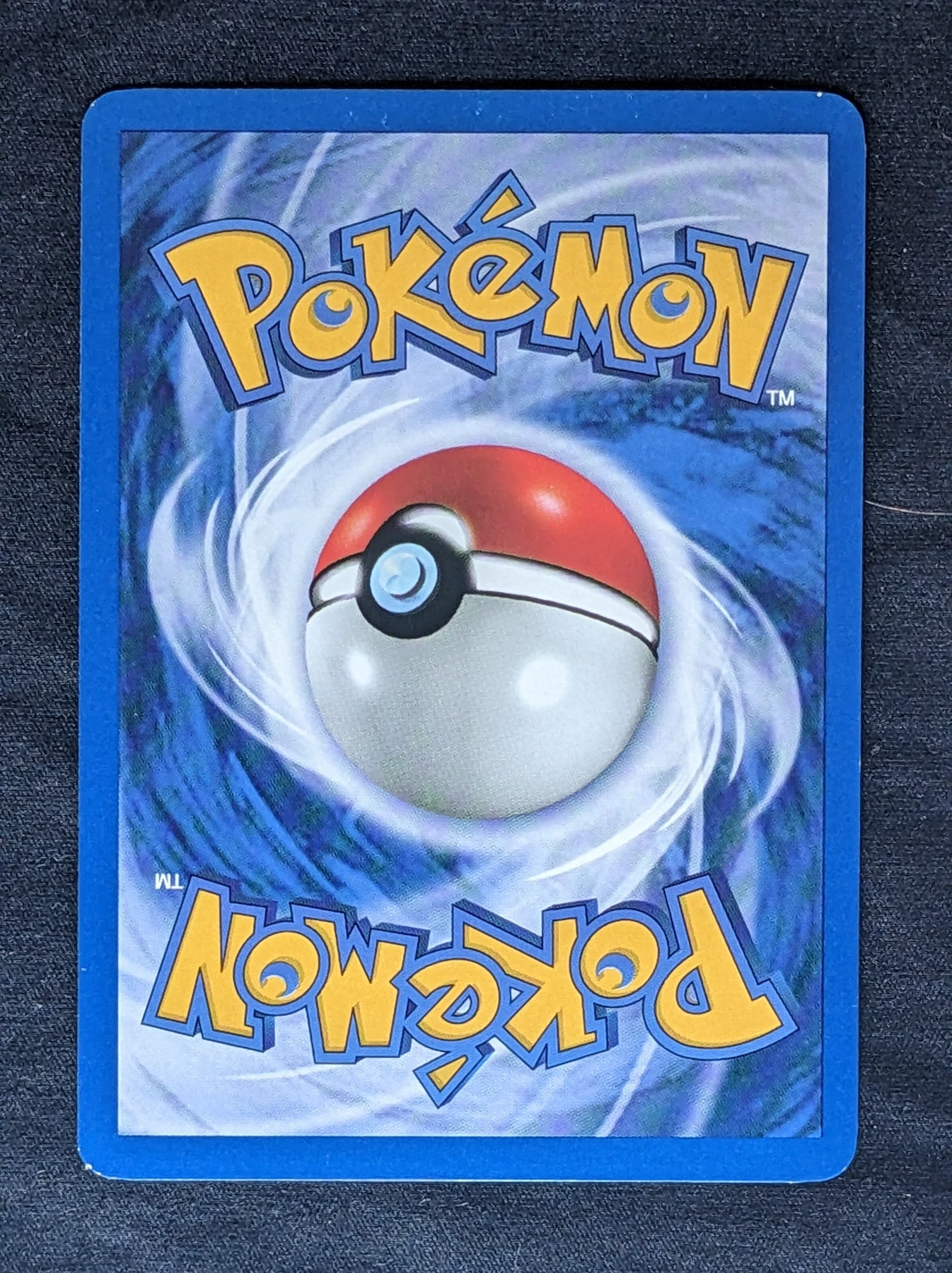 Dark Charizard 004/82 (First Edition Stamp) Team Rocket back card photo in PokeToGrade pregrading report