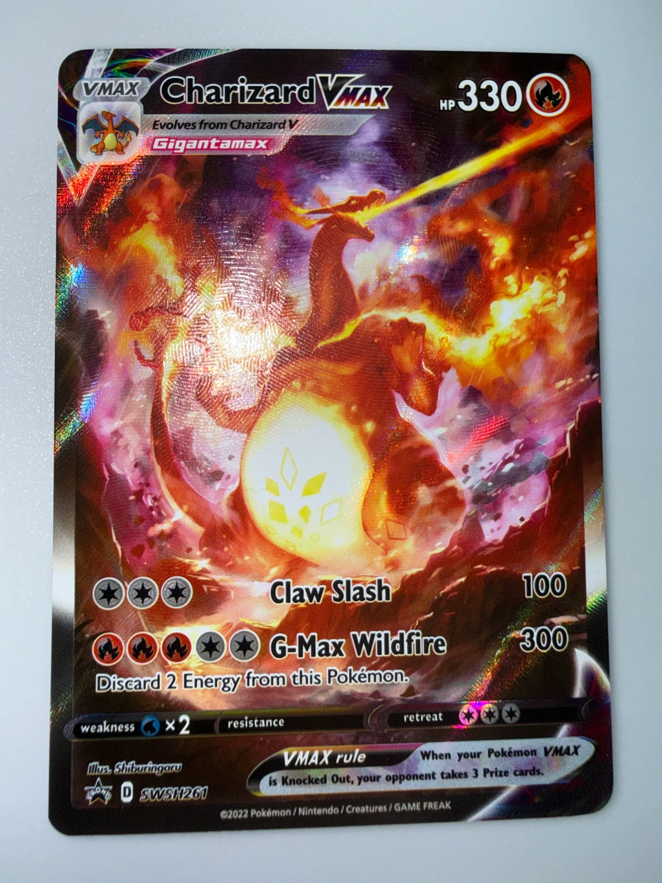 Charizard VMAX SWSH261/307 SWSH Black Star Promos front card photo in PokeToGrade pregrading report