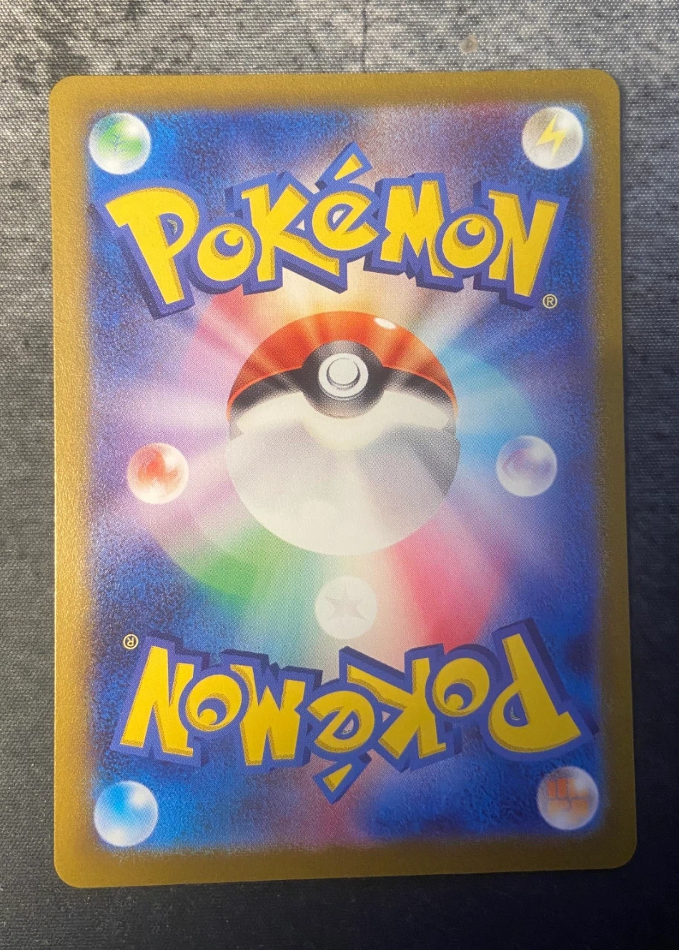Maushold 081/71 Clay Burst back card photo in PokeToGrade pregrading report