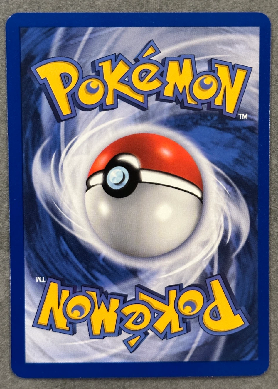 Blaine's Moltres 001/132 Gym Heroes back card photo in PokeToGrade pregrading report