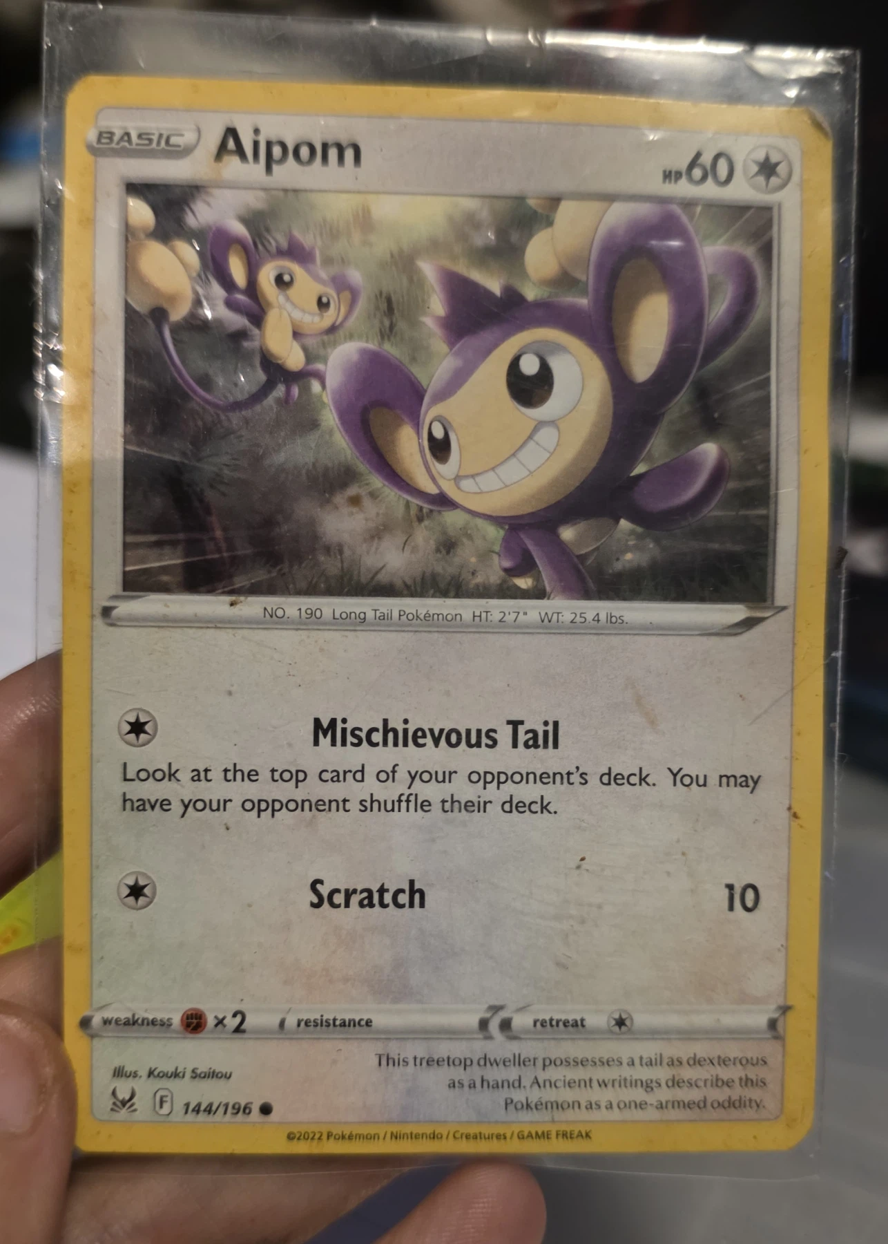 Aipom 144/196 Lost Origin front card photo in PokeToGrade pregrading report