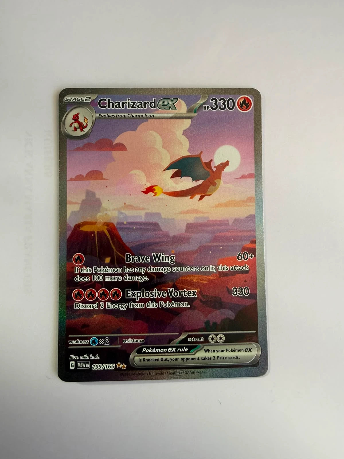 Charizard ex 199/165 151 front card photo in PokeToGrade pregrading report