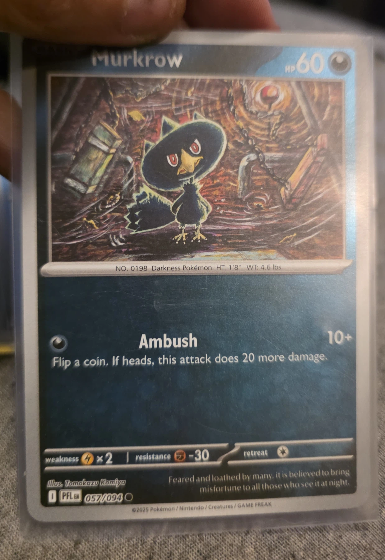 Murkrow 057/94 Phantasmal Flames front card photo in PokeToGrade pregrading report