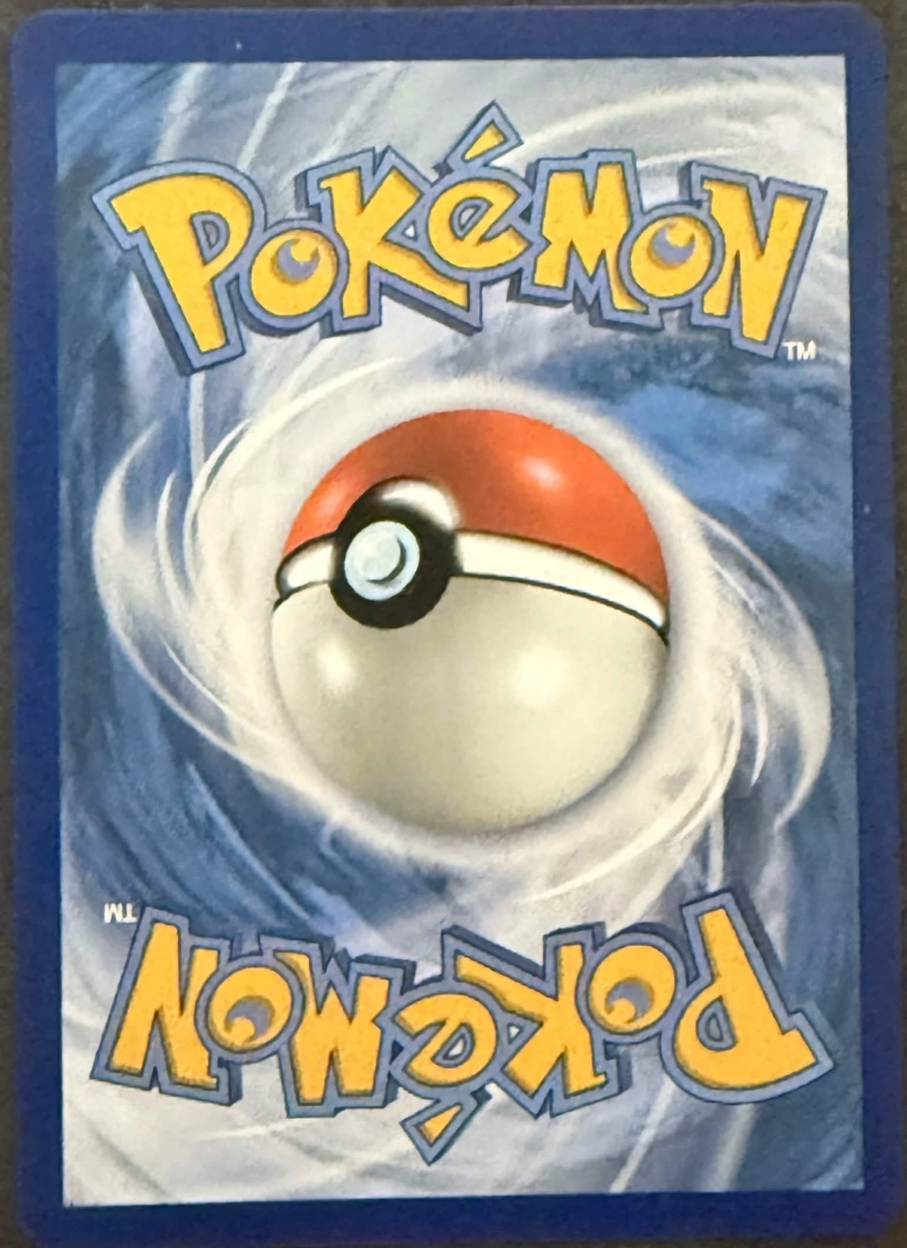 Mega Charizard X ex 125/94 Phantasmal Flames back card photo in PokeToGrade pregrading report