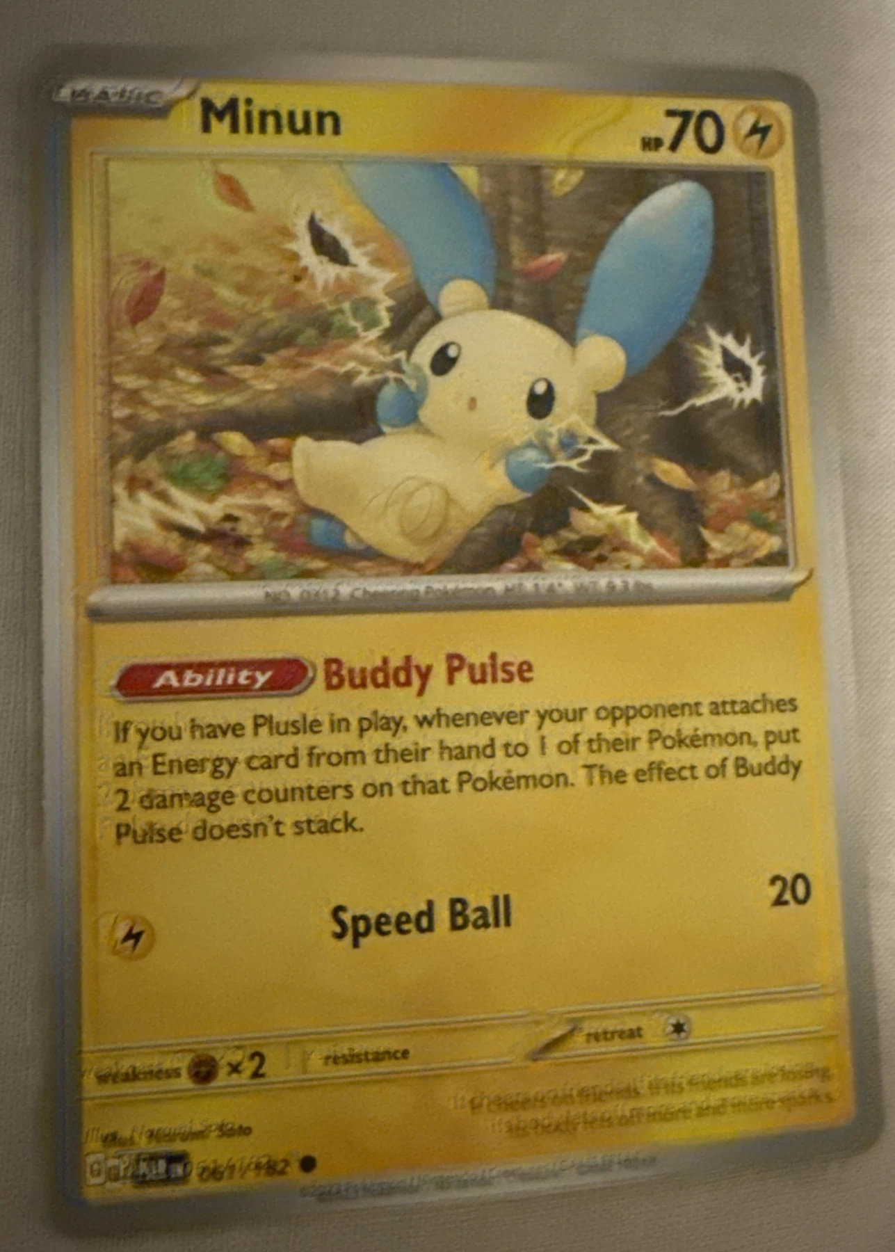 Minun 061/182 Paradox Rift front card photo in PokeToGrade pregrading report