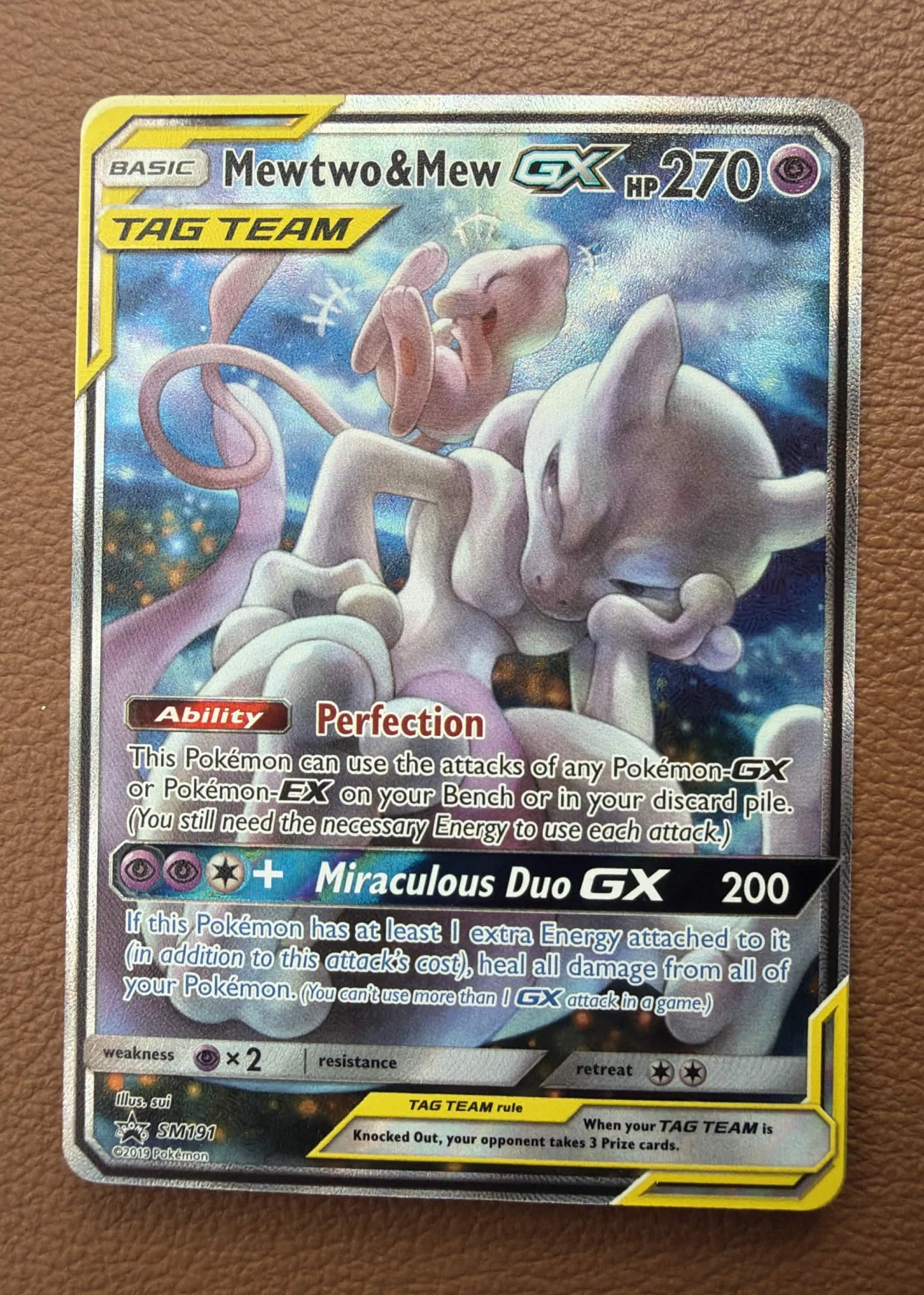 Mewtwo & Mew GX SM191/248 SM Black Star Promos front card photo in PokeToGrade pregrading report