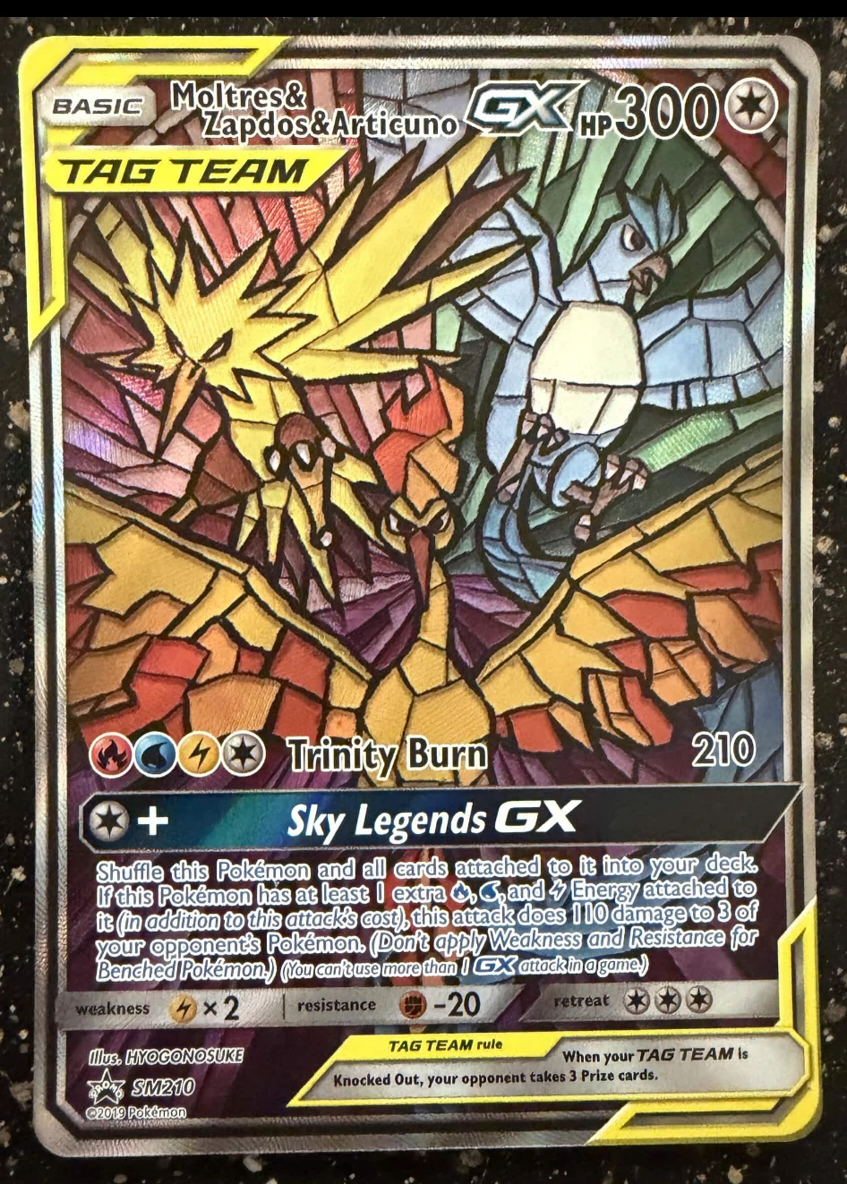 Moltres & Zapdos & Articuno GX SM210/248 SM Black Star Promos front card photo in PokeToGrade pregrading report