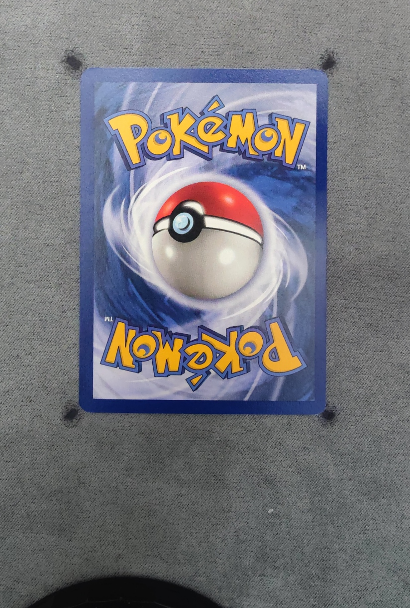 Moltres 012/62 (First Edition Stamp) Fossil back card photo in PokeToGrade pregrading report