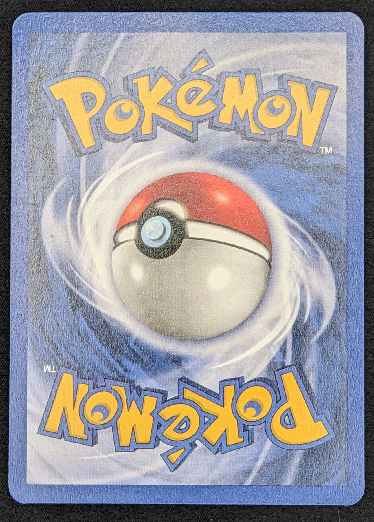 Dark Charizard 021/82 · First Edition Stamp Team Rocket back card photo in PokeToGrade pregrading report