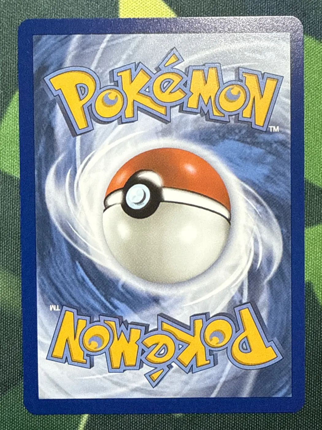 Rowlet 090/88 Perfect Order back card photo in PokeToGrade pregrading report