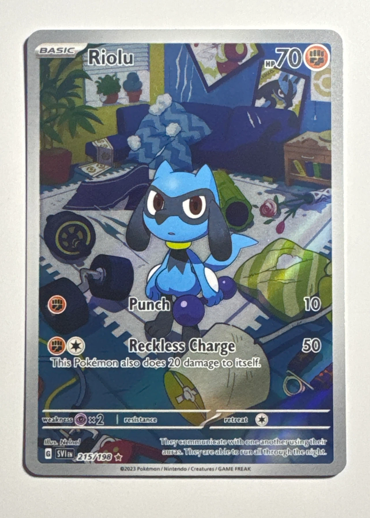 Riolu 215/198 Scarlet & Violet front card photo in PokeToGrade pregrading report