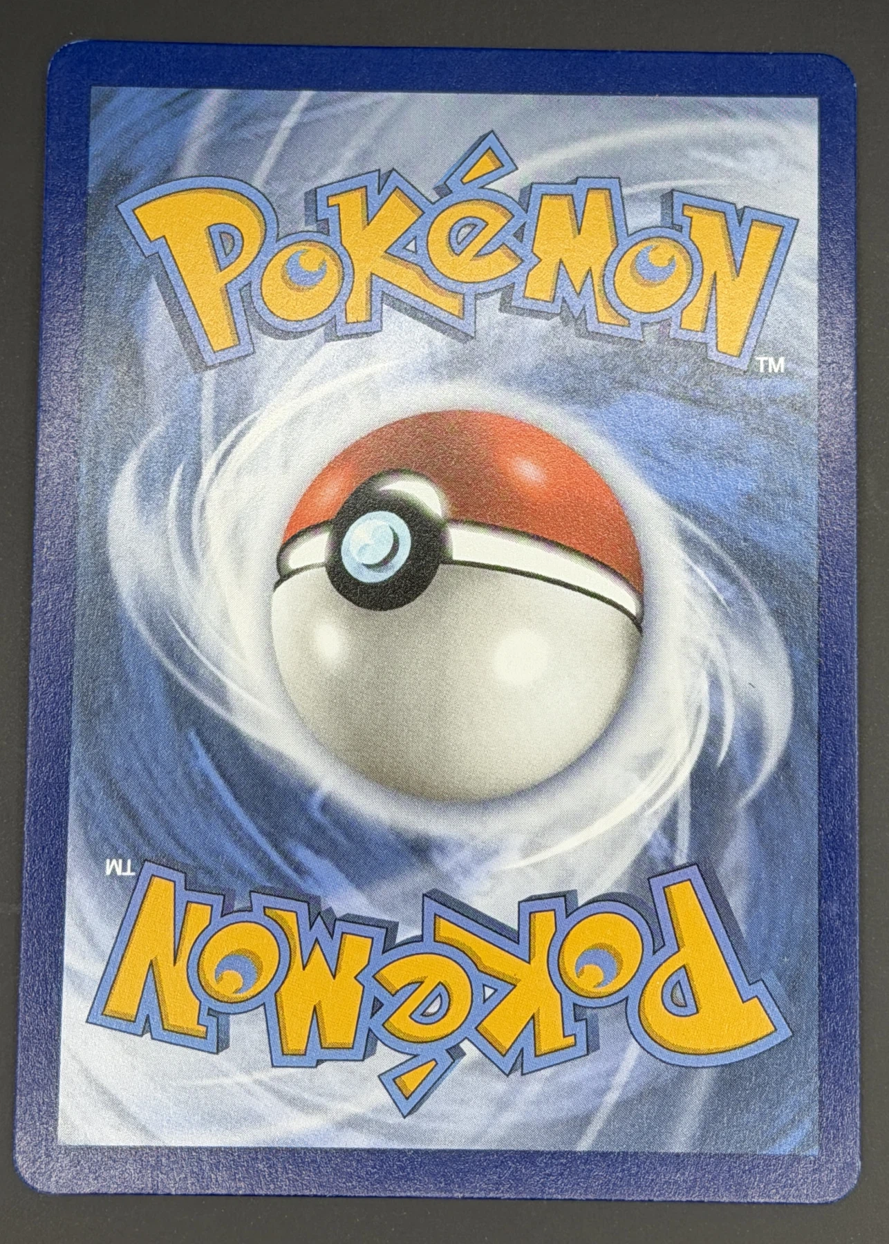 Umbreon VMAX 215/203 Evolving Skies back card photo in PokeToGrade pregrading report