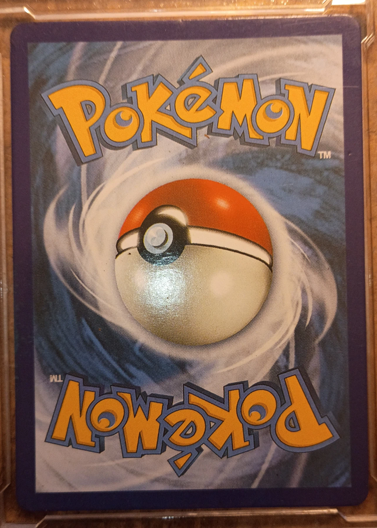 Blaine's Charizard 002/132 (Holo) Gym Challenge back card photo in PokeToGrade pregrading report