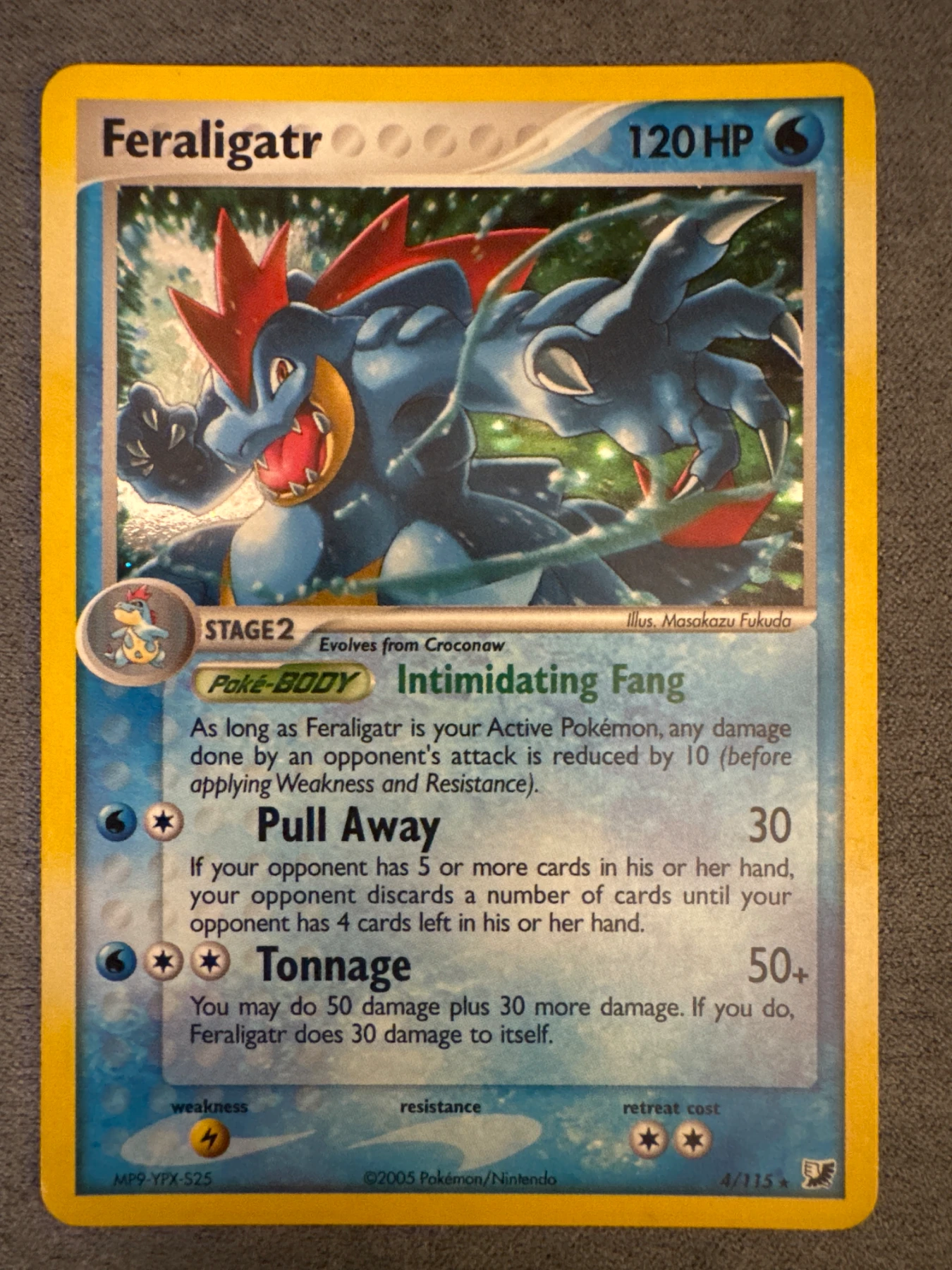 Feraligatr 004/115 Unseen Forces front card photo in PokeToGrade pregrading report