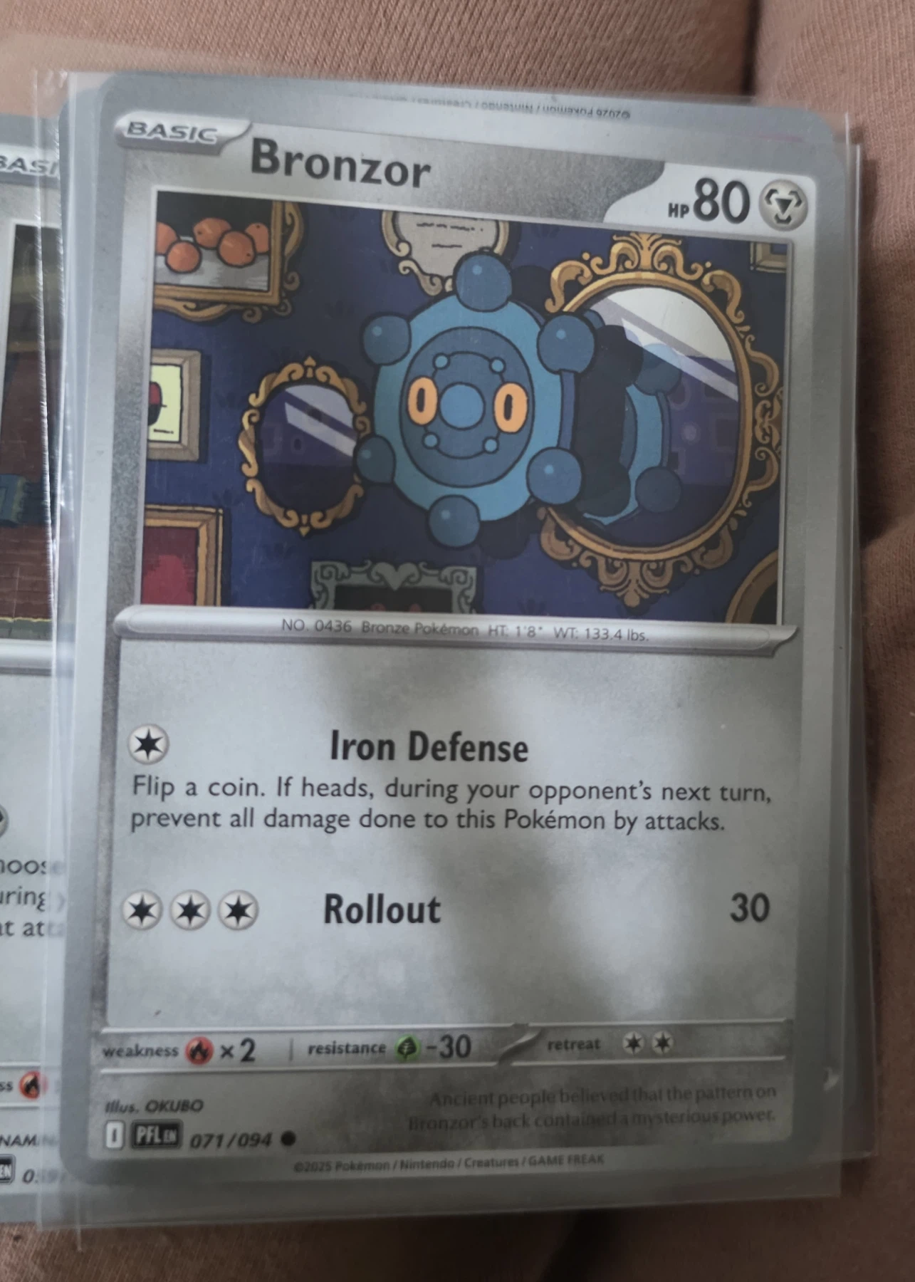 Bronzor 071/94 Phantasmal Flames front card photo in PokeToGrade pregrading report