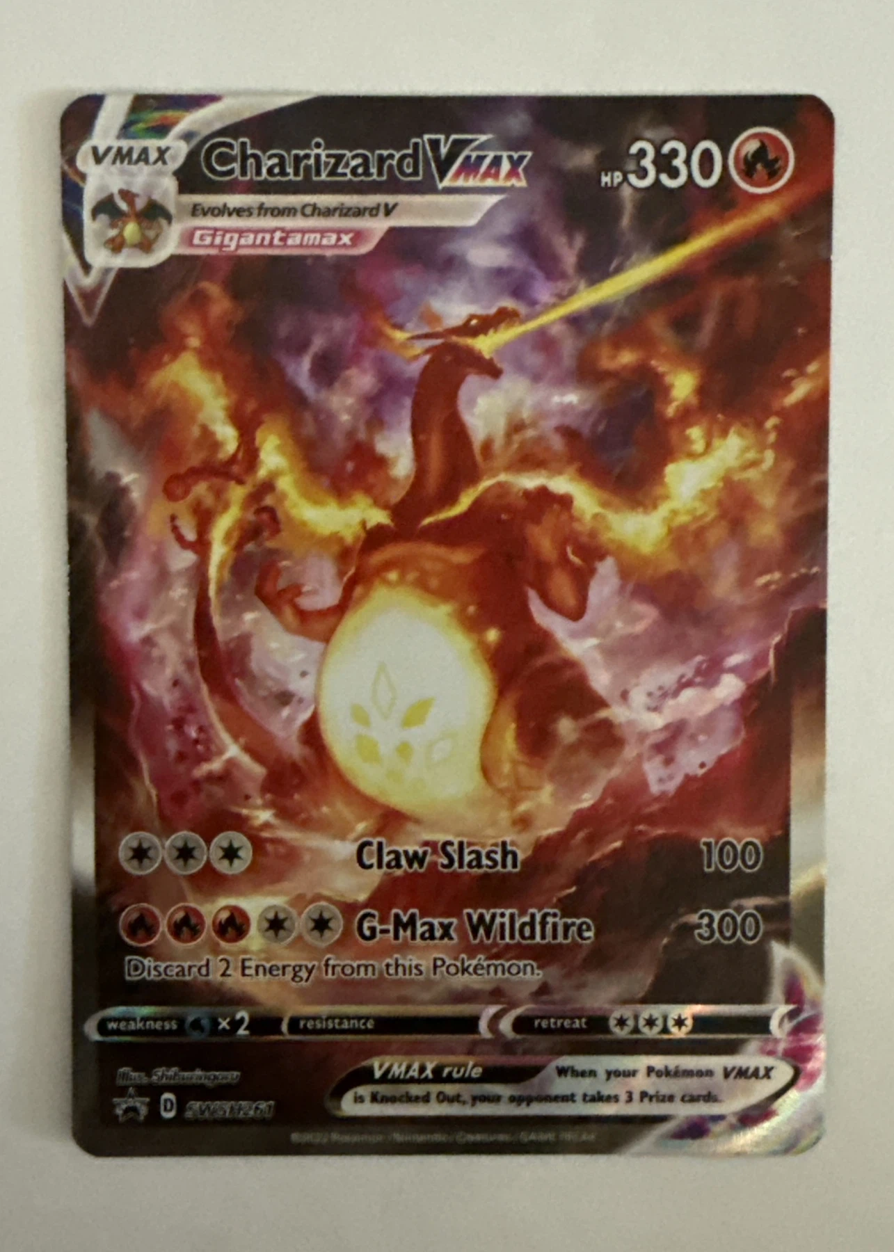 Charizard VMAX SWSH261/307 SWSH Black Star Promos front card photo in PokeToGrade pregrading report