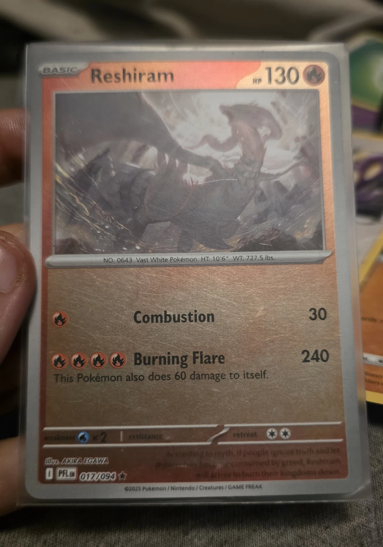 Reshiram 017/94 Phantasmal Flames front card photo in PokeToGrade pregrading report