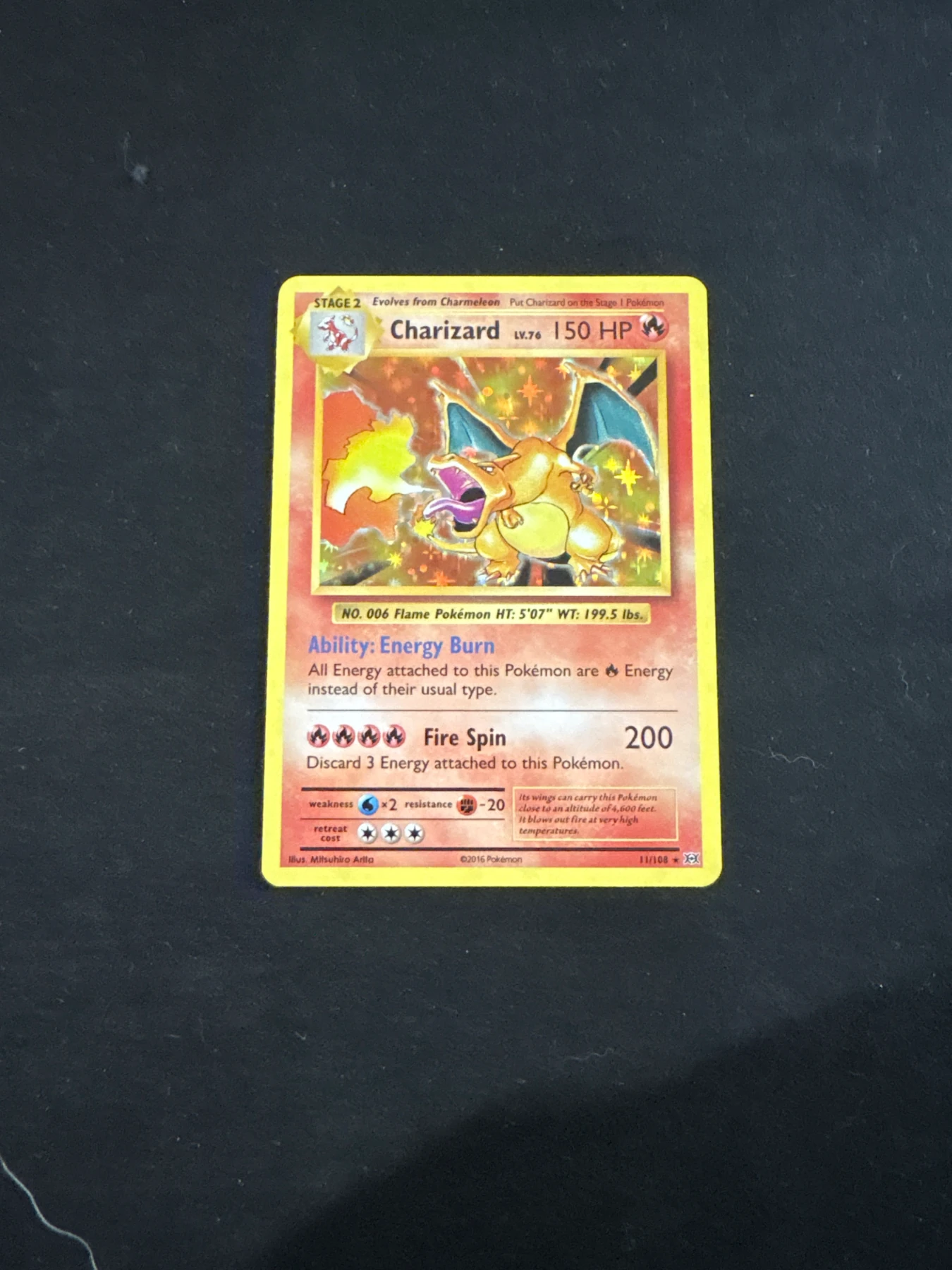 Charizard 011/108 Evolutions front card photo in PokeToGrade pregrading report