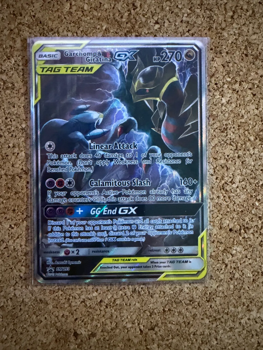 Garchomp & Giratina GX SM193/248 SM Black Star Promos front card photo in PokeToGrade pregrading report