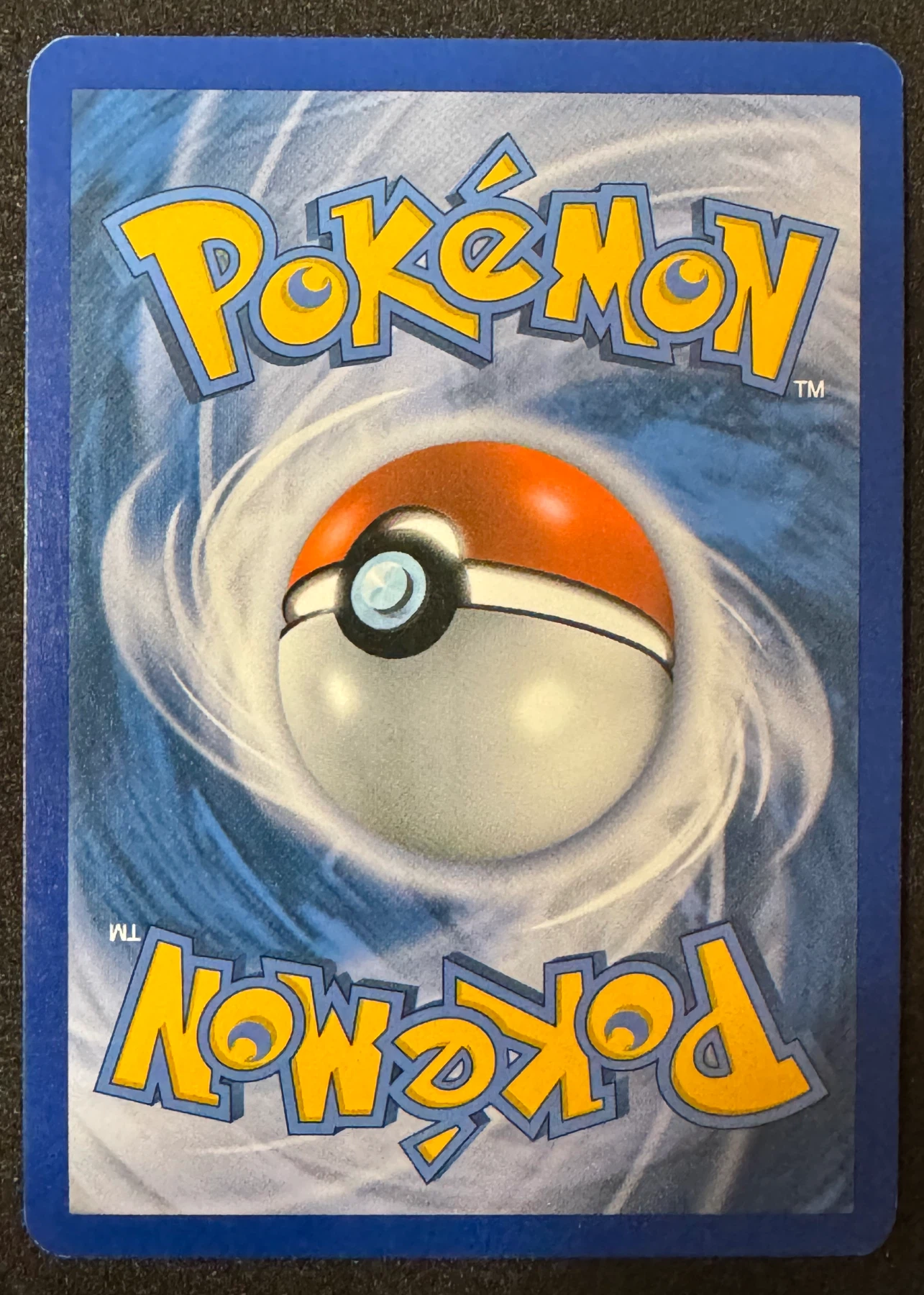 Umbreon 086/90 Undaunted back card photo in PokeToGrade pregrading report