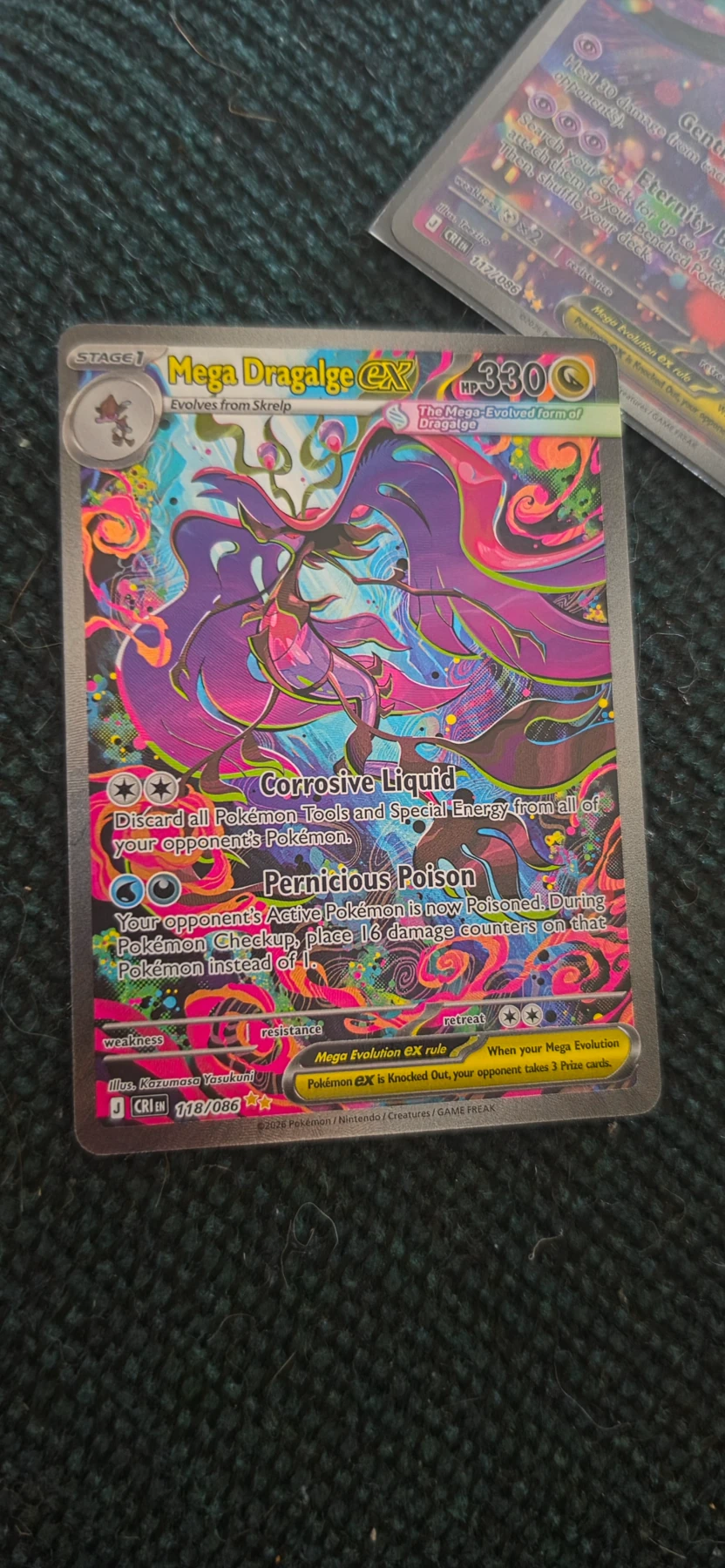 Mega Dragalge ex 118/86 Chaos Rising front card photo in PokeToGrade pregrading report