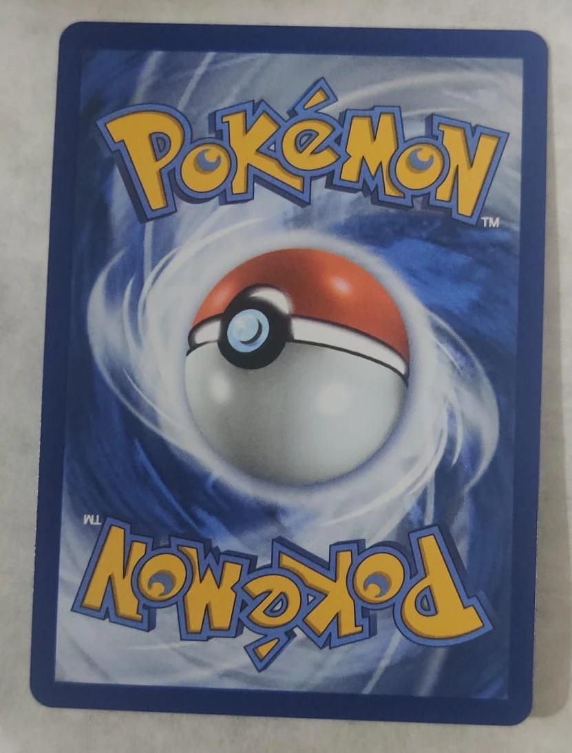 Eri 136/131 Prismatic Evolutions back card photo in PokeToGrade pregrading report