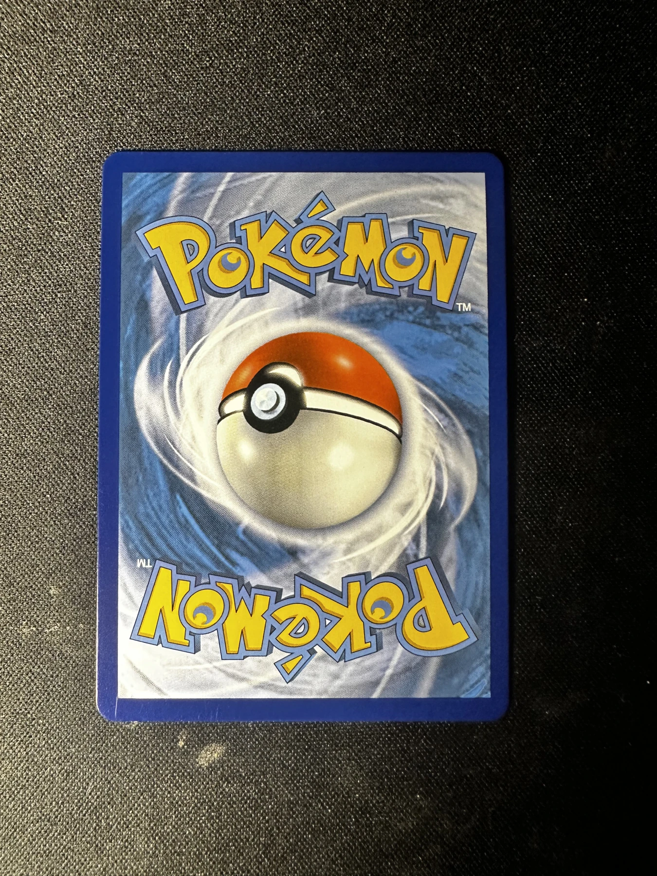 Reshiram & Charizard GX 020/214 Unbroken Bonds back card photo in PokeToGrade pregrading report
