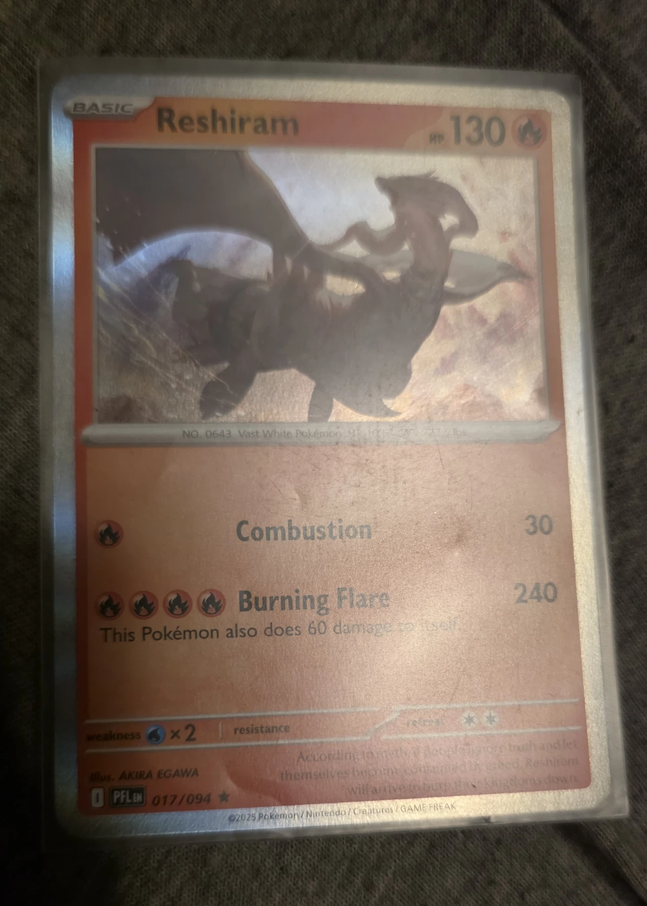 Reshiram 017/94 Phantasmal Flames front card photo in PokeToGrade pregrading report