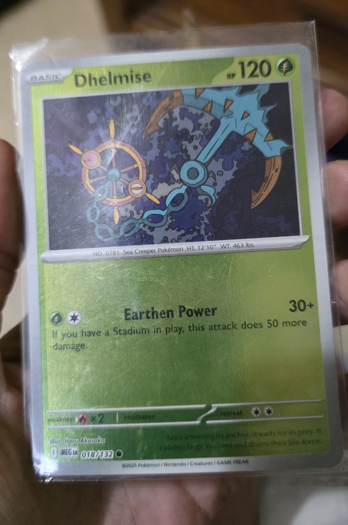 Dhelmise 018/132 Mega Evolution front card photo in PokeToGrade pregrading report