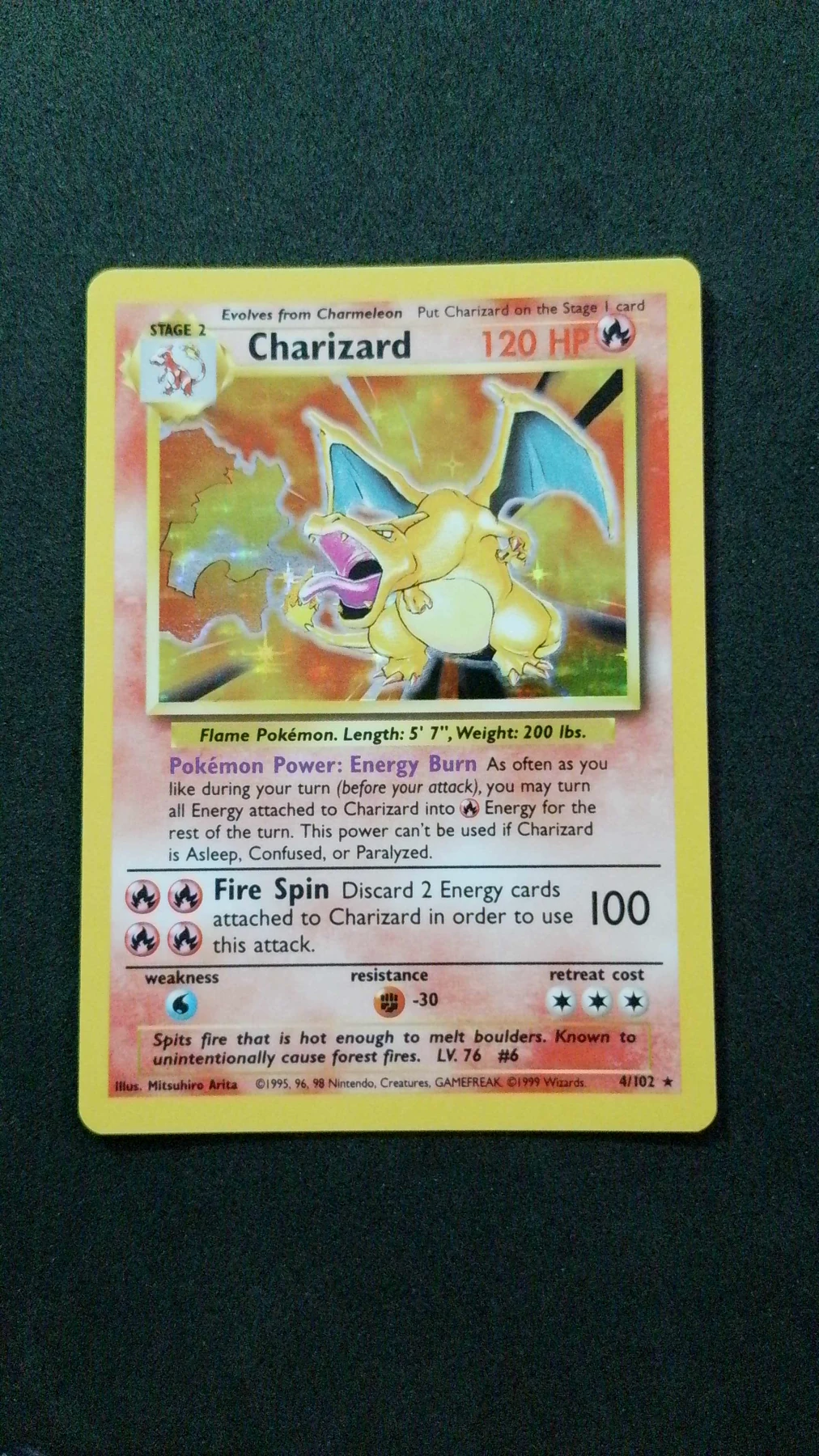 Charizard 004/102 · Holo Base Set front card photo in PokeToGrade pregrading report