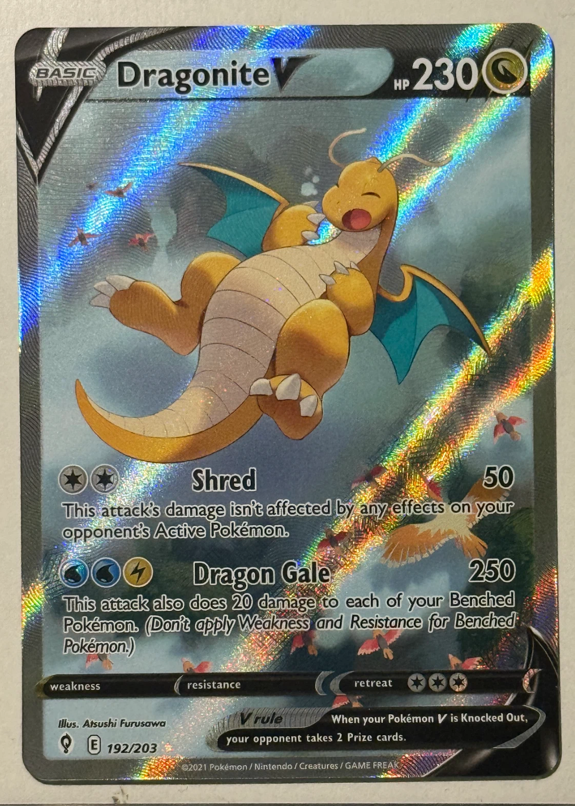 Dragonite V 192/203 Evolving Skies front card photo in PokeToGrade pregrading report