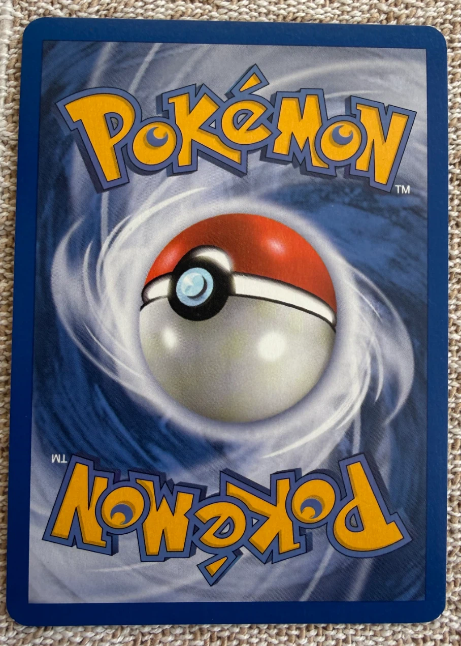 Dark Houndoom 005/109 Team Rocket Returns back card photo in PokeToGrade pregrading report