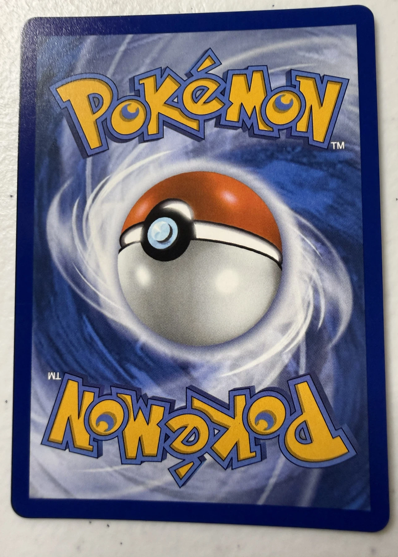 Mega Charizard X ex 125/94 Phantasmal Flames back card photo in PokeToGrade pregrading report