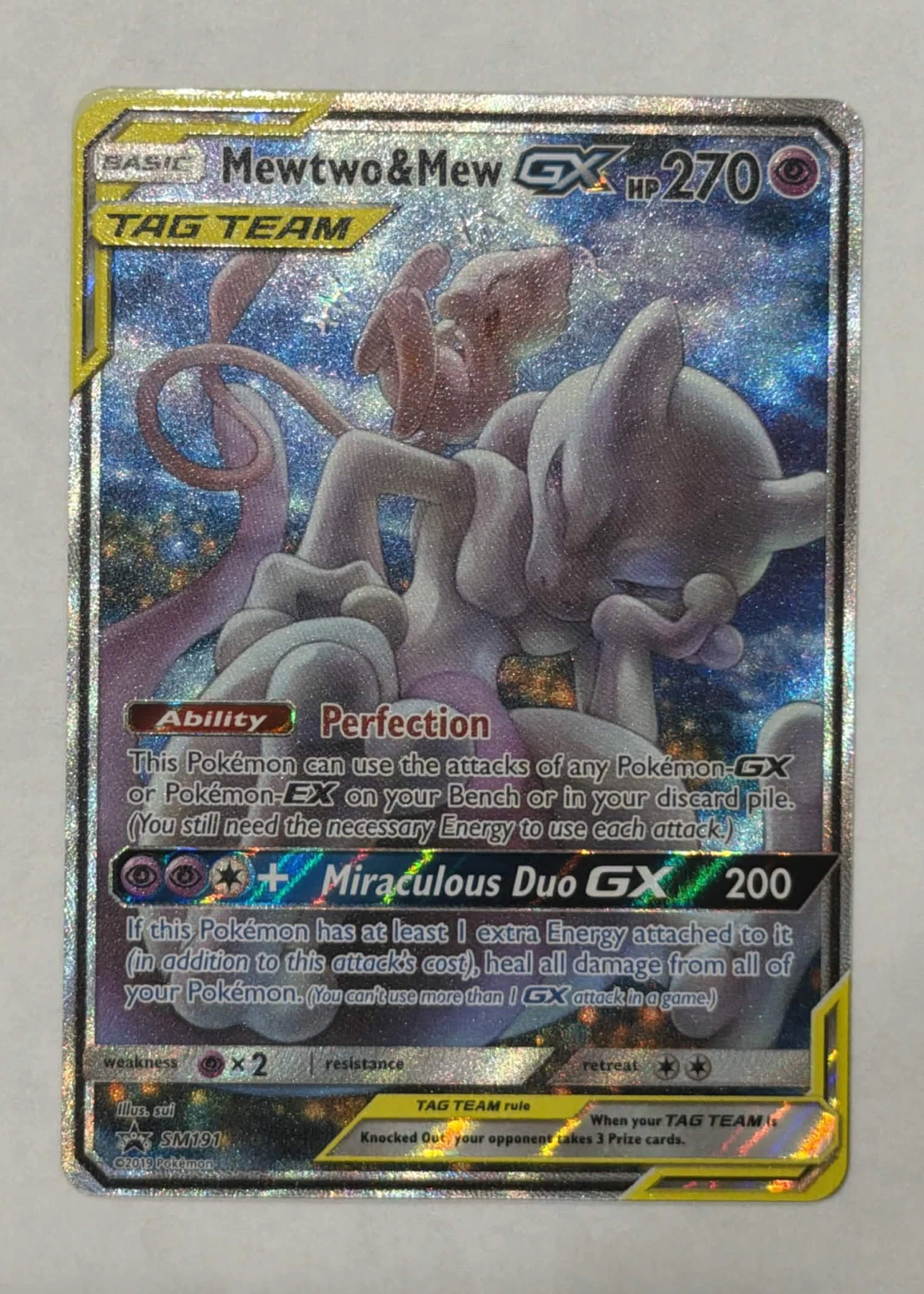 Mewtwo & Mew GX SM191/248 SM Black Star Promos front card photo in PokeToGrade pregrading report
